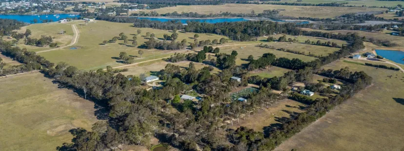 Aerial view of the ten acre property and the lakes beyond